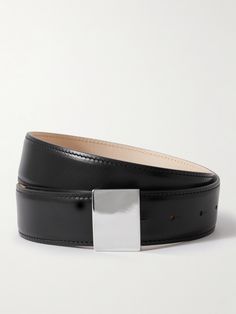 The clean lines of Déhanche's belt are inspired by the Bauhaus movement. It's crafted from smooth leather and has a polished, silver-tone square buckle. Style it with jeans and tailored pants alike. Modern Belts With Palladium Hardware For Business, Modern Leather Belt Buckles With Palladium Hardware, Modern Belts With Rectangular Buckle For Formal Occasions, Classic Leather Belt With Silver-tone Logo Plaque, Modern Belts With Rectangular Buckle For Business, Modern Formal Belt Buckles With Palladium Hardware, Modern Leather Belt Buckles, Modern Leather Belt Buckles For Office, Designer Formal Belt Buckle Rectangular