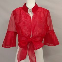 Gorgeous Dressy Red Crop Topper Jacket, Wear Over A Formal Dress Or Shift. Slightly Shimmery Fabric, Exceptional Quality Construction. Designer Sonia Pena, Made In Spain. Condition As New, Looks Never Worn, No Damages Or Issues. Size Marked 48, European Sizing. Us Lg/Xl. 12/14. Versatile Piece To Add A Vibrant Splash Or Color And Classy Style. 3 Pieces By This Designer, All True Red And Fabulous. Pit To Pit Across The Back 23", Length 17.75". Elegant Fitted V-neck Shrug, Fitted Summer Party Outerwear, Elegant Summer Party Outerwear, Summer Party Shrug With Stretch, Stretch Summer Party Shrug, Red Fitted V-neck Outerwear, Sheer Outerwear For Spring Party, Sheer Long Sleeve Party Outerwear, Spring Sheer Party Outerwear