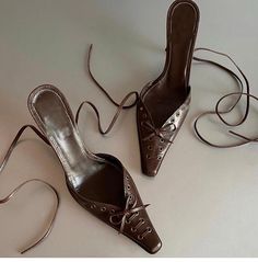 These are stylish high-heeled mules made from brown leather. The design features a pointed toe with lace-up detailing that resembles a butterfly bow, adding a touch of elegance and femininity. The heels have a sleek and glossy finish, enhancing their sophisticated look. They are perfect for both casual and formal occasions, providing a chic and versatile option for various outfits. The leather material ensures durability and comfort, making these heels a practical yet fashionable choice. Details Retro Heels, Summer Formal Dresses, Butterfly Bow, Bodycon Dresses Casual, Popular Dresses, Strapless Tops, Leather High Heels, Swimsuit Cover Ups, Long Sleeve Bodycon Dress