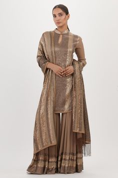 Mouse kurta with sequin embroidery and mandarin neck. Paired with embroidered sharara and embroidered fringe hem dupatta.
Components: 3
Pattern: Embroidered
Type Of Work: Sequin
Neckline: Mandarin
Sleeve Type: Three Quarter
Fabric: Chiffon
Color: Grey
Other Details: 
Sequin work
Embroidered dupatta
Occasion: Sangeet,Reception - Aza Fashions Unstitched Chinon Sharara For Reception, Reception Palazzo Set With Straight Kurta In Georgette, Elegant Sequined Palazzo Set In Georgette, Diwali Traditional Wear In Art Silk With Sequins, Georgette Palazzo Set With Mirror Work, Reception Georgette Palazzo Set With Mirror Work, Reception Palazzo Set With Mirror Work In Georgette, Bollywood Style Traditional Wear With Sequins In Art Silk, Wedding Sharara With Sequins