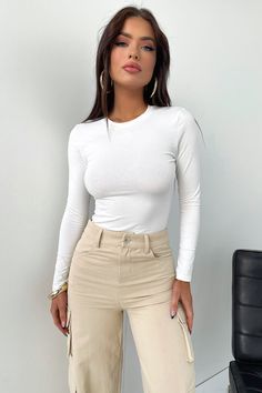 Oh baby, she's a basic you need! Elevate your everyday wardrobe with the Lemar long sleeve, offering a super soft, stretchy material, long sleeves, a round neckline and a THATSSOFETCH logo across the back. Style her with basic denim jeans and sandals for a casual stroll around the city.
FABRICATION:

95% Polyester / 5% Elastane
SIZING:
Crystal's height is 162cm and wears a size AU6/US2 Orange Swimwear, Green Swimwear, Summer Formal Dresses, Red Swimwear, Lounge Sweater, White Swimwear, Blue Swimwear, Pink Swimwear, Long Sleeve Casual Dress