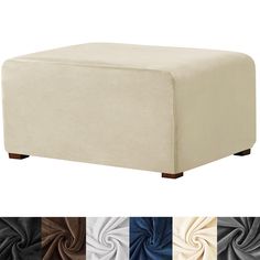 a white ottoman with multiple colors of fabric