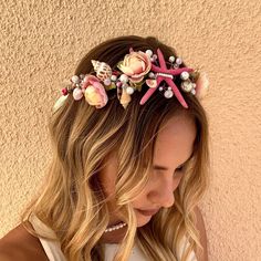 This elegant hair piece made with seashell, starfish, pearls, roses and  crystals.   These kinds of hairbands are loose enough not to give headaches (for those sensitive to that) but still stay in place! This headband is perfect for bride, bridesmaid, and flower girl. Shipping: -tracking number -your item will be carefully packaged and shipped with love Custom order always welcome, please contact us. Thanks for looking! https://www.etsy.com/shop/CyShellBridal Seashell headpiece Shell headpiece S Shell Headpiece, Seashell Headpiece, Beach Hair Accessories, Seashell Crown, Mermaid Crown, Pink Crown, Hair Wreath, Elegant Hair, Beach Bridal