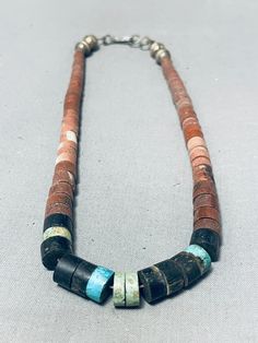 "MAKE US AN OFFER BY CLICKING THE \"MESSAGE SELLER\" Button- This is an appealing vintage Santo Domingo necklace! It features a single strand of turquoise, pipestone, and jet beads, 4 silver beads, and a silver hook and eye clasp! So Noteworthy! Sterling silver. The length of the necklace measures around 15\". Sturdy 34 grams. Cir Mid Century + Make Us an Offer- Due to the high demand of our items, many pieces sell quite fast. The most frequent email we receive are from buyers who waited too lon Vintage Turquoise Necklace With Round Beads, Vintage Turquoise Necklace With Round Natural Stones, Vintage Natural Stones Beaded Necklaces, Vintage Beaded Necklaces With Natural Stones, Vintage Beaded Necklaces With Natural Turquoise Stones, Vintage Multicolor Turquoise Necklace With Natural Stones, Cameo Necklace, American Traditional, Sterling Silver Necklace