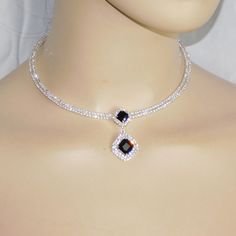 Main Stone: Rhinestone / Crystal Color: Black Onyx Main Color: Silver Necklace Measures Approx: 15" Pendant Drop: 1.1/2" Earrings: 1"L Pierced With Bullet Disc Backs Brand New In Original Package You Will Receive This Item Even More Beautiful Than The Pictures! :) Cubic Zirconia Dangle Rhinestone Necklace For Party, Dangle Rhinestone Necklace For Party, Party Rhinestone Dangle Necklace With Cubic Zirconia, Party Dangle Rhinestone Necklace With Cubic Zirconia, Crystal Rhinestone Dangle Jewelry, Crystal Dangle Jewelry With Rhinestones, Crystal Pendant Jewelry For Party, Party Dangle Rhinestone Necklace, Party Pendant Rhinestone Necklace In Cubic Zirconia