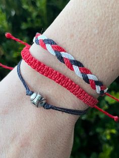 This bracelet stack is handmade by me from Brazilian waxed cord with adjustable backs. This includes 2 bracelets that  can adjust from 6 inches to 8.5 inches in length.  Minnesota Twins Baseball themed bracelet stack in red, black and white ⚾️💙❤️🤍 Like the bracelet, but not the colors? This can be customized to any team colors of your choosing. Just let me know! Red Macrame Beaded Bracelets For Friendship, Casual Red Friendship Bracelets With Adjustable Cord, Red Adjustable Macrame Bracelets, Adjustable Red Macrame Bracelets, Red Macrame Friendship Bracelets For Beach, Red Casual Beaded Bracelet With Adjustable Cord, Red Beaded Bracelet With Adjustable Cord, Red Adjustable Braided Waxed Cord Bracelets, Casual Red Braided Waxed Cord Bracelets