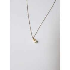 This is part of Chairish’s Fine Jewelry assortment.  A very beautiful white cultured pearl and 14-karat yellow gold necklace, circa mid-20th century. Pearl is very beautiful with a high luster. Pearl has a 14-karat yellow gold crown-like design attached to 14-karat yellow gold necklace. A beautiful piece to wear alone or stack with other necklaces. Very good condition as shown in images. No issues. Dimensions: pearl pendant is over 1/2" long x .25" Width. Necklace, from end to end, measures 19.2 Yellow Gold Necklace, Gold Crown, Gold Pendant Necklace, Pearl Pendant, Gold Pendant, 20th Century, Gold Necklace, Fine Jewelry, Yellow Gold