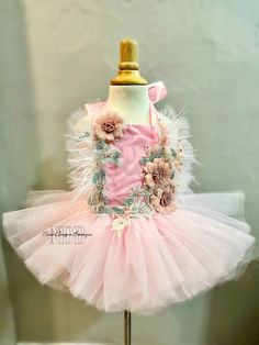 Introducing our new creation. This is a tutu dress. It's one piece! The dress ties around the neck halter style. Completely backless, and sits above the knee. The skirt is made of good quality full tulle. Perfect for cakesmash photo sessions, birthdays or any other special occasions your little one needs to be fabulous for!  **  Before placing your order please make sure to check the shipping time & see if you're ok with the time frame. If you need the item before a specific date please message Pink Summer Fairy Dress For Wedding, Pink Fairy Dress For Summer Wedding, Pink Whimsical Fairy Dress For Spring, Whimsical Pink Fairy Dress For Spring, Pink Princess Fairy Dress For Spring, Cute Sleeveless Tutu Dress For Pageants, Spring Pink Princess Fairy Dress, Cute Sleeveless Tutu Dress For Pageant, Sleeveless Summer Tutu Dress For Pageants