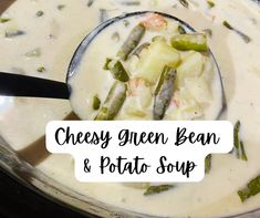 a spoon full of cheese green bean and potato soup with the words cheesy green bean and potato soup