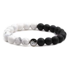 PRICES MAY VARY. This bracelet contains Chinese Tai Chi patterns, also named yin yang symbol. The color consists of black and white. The bead size is 8MM. It is elastic, about 19 cm. Can fit all wrists of men and women. Taiji is an ancient Chinese philosophy about the natural world and is one of the central elements of traditional Chinese culture. The word Taiji itself refers to the ?great primal beginning? of all that exists, and is often translated as the ?Supreme Ultimate?. It is the state of Beaded Couple Bracelets, Friendship Distance, Distance Bracelet, Yin Yang Charm, Distance Bracelets, Bracelets Friendship, Turquoise And Black, Couple Bracelets, Black Bracelets