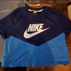 Nike Colorblock Crop Tee Nwot Dark Blue/Lighter Blue Size Xs Cropped Runs A Bit Small Casual Blue Color Block T-shirt, Color Block Short Sleeve Athleisure Tops, Athleisure Color Block Short Sleeve Tops, Blue Sporty Crew Neck Top, Sporty Blue Color Block Tops, Blue Crew Neck Top With Logo Print, Nike Blue Top With Logo Print, Nike Blue Tops With Logo Print, Blue Sporty Short Sleeve Top