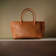 Embrace style with the intricate basket weave design that adds a touch of artisanal charm to your ensemble. The large capacity of this bag ensures that you carry all your essentials, making it perfect for any occasion. Its lightweight materials make it a breeze to carry. Now available in black, caramel, brown, and army green. Bangle Ring, Caramel Brown, Basket Weave, Shopper Bag, Love Ring, Black Tote Bag, Bag Set, Necklace Earring Set, Clutch Handbag