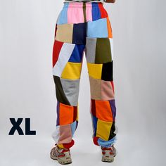 We offer a unique and colorful patchwork design pants. The colors of each model are unique and not repeatable. Add stylish and vibrant notes to your look. This demi-season clothes is made of the highest quality cotton fabric, very comfortable and pleasant to the touch. The pants are very comfortable and do not restrict movement, suitable for home, jogging, yoga, walking in the fresh air. If you like bright and unusual things, then this sweatpants will be a great choice for you or for those to wh Casual Multicolor Patchwork Pants, Casual Cotton Patchwork Sweatpants, Trendy Multicolor Color Block Pants, Trendy Multicolor Sweatpants For Streetwear, Trendy Multicolor Streetwear Sweatpants, Multicolor Cotton Joggers For Loungewear, Sporty Cotton Patchwork Pants, Multicolor Patchwork Pants For Loungewear, Multicolor Patchwork Bottoms For Loungewear