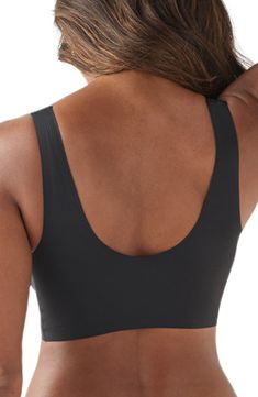 Supersoft fabric and a wireless design give you the support you need in this V-neck bra that hugs curves and disappears under clothing. Lined, with removable cups 77% nylon, 23% elastane Hand wash, line dry Imported Seamless Shaping Shapewear With Wide Straps, Shaping Seamless Shapewear Bra, Shaping Seamless Bra, Underwire Seamless Sports Bra For Shapewear, Seamless Underwire Sports Bra For Shapewear, No-show Seamless Shapewear Bra, Seamless No-show Bra For Shapewear, Full Coverage Shaping Sports Bra With Seamless Construction, Full Coverage Shaping Seamless Sports Bra