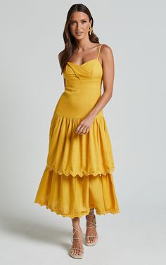 Get ready to turn heads in the Amalie The Label Cameo Linen Blend Low Back Tiered Midi Dress! This stunning dress in warm yellow gold is perfect for any party day or night. With its tiered design and low back, it's a statement piece that will make you feel confident and stylish. Made from a blend of viscose and linen, this dress is not only comfortable but also breathable, making it ideal for those hot summer days. Its sleeveless style adds an extra touch of femininity, while the midi length kee Warm Yellow, Keep It Classy, Tiered Midi Dress, Viscose Fabric, Tiered Dress, Stunning Dresses, Low Back, Yellow Dress, Feel Confident