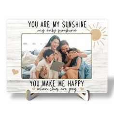 a family picture frame with the words you are my sunshine on it