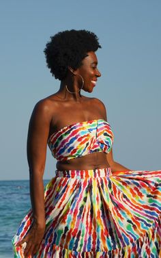 Lekki Love Bandeau Top gets its name from the Lekki Beach in Nigeria! This playful crop top was designed for your travels. Giving you options to cover or show your midriff depending on your mood. Featuring attached ties that can be wrapped and tied in multiple ways. Get creative & daring as you style our Lekki Love Bandeau Top to best suit you. Pair it with our Tanji Tide Tiered Skirt, jeans, or something that's already in your closet! Create memories of a lifetime and Beam Bold in our Lekki Lov Skirt Jeans, Prints Fabric, Create Memories, Brand Story, Fabric Silk, Get Creative, Tier Skirt, Bandeau Top, Tiered Skirt