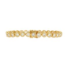 Natural diamond bezel set tennis bracelet in 18K solid yellow gold. Available in 10 carats total with 6.2mm, or 7.83 carats total with 5.5mm. The stones are superbly white, eye clean, and full of brilliance and sparkle. The bezel setting is thick on the width but open on the back, offering a study feel while not being too tall and bulky on the wrist. Ideal for daily wear, waterproof, and hypoallergenic.   Item Details: Type: Diamond Tennis Bracelet Metal: 18K Yellow Gold  Color: F-G  Clarity: VS2-Sl1 Closure: Box Closure Setting: Bezel Length: 7 inches  Certification by CGL  Diamond Details:   Option 1: 10.03 Carats TW 6.2mm Width  Option 2:  7.83 Carats TW 5.5mm Width Luxury Tennis Bracelet With Bezel Setting For Anniversary, Luxury Bezel Setting Tennis Bracelet For Anniversary, Formal 14k Gold Tennis Bracelet With Bezel Setting, Yellow Gold Diamond Tennis Bracelet With Bezel Setting, Fine Jewelry Yellow Gold Tennis Bracelet With Bezel Setting, Classic Gold Tennis Bracelet With Bezel Setting, Classic Yellow Gold Tennis Bracelet With Bezel Setting, Yellow Gold Tennis Bracelet With Bezel Setting, Luxury Gold Tennis Bracelet With Bezel Setting