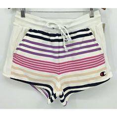 A Women's Pair Of Shorts From Champion From Urban Outfitters In A Reverse Weave Candy Stripe Style. The Shorts Has A Drawstring Waist, Pockets, And Are New With Tags Size Medium Shelf Multicolor Sporty Cotton Bottoms, Multicolor Cotton Sporty Bottoms, Large Shelf, Champion Shorts, Champion Reverse Weave, Candy Stripes, Purple Gray, Purple Grey, Color Purple