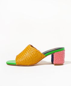 Who is she? If you loved Lenu, you probably like color. And if you like color, you'll definitely love Katie Kortman, which is exactly why we asked her to be our second-ever CS Color Muse™ and color everyone's favorite multicolor shoe. She's still hand-woven in India using soft multi-toned Nappa leather from her upper to her 2.5" heel, and she's still equal parts statement shoe and jeans-and-tee slide, but this time, she's in every color Katie could possibly imagine. Click here to get to know the Bold Multicolor Sandals For Spring, Designer Heels With Woven Sole For Spring, Multicolor Leather Sole Sandals For Spring, Multicolor Sandals With Leather Sole For Spring, Multicolor Flat Heel Heels For Spring, Multicolor Open Toe Heels With Contrasting Heel Counter, Modern Multicolor Sandals With Round Toe, Modern Multicolor Round Toe Sandals, Multicolor Medium Width Heels For Spring