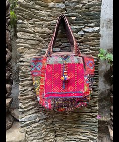 About bag  Indo-gypsy fusion, everyday use hand bag made from Banjara fabrics sourced from Vintage tribal costumes of regions of Rajastan and Gujarat. These are embellished with light catching coins, and intricate bead work tassels. Size - length 15 inches/ width 21 inches Company details:  Company name: Houseoftextile  Contact number: +919784447473  Email id: houseoftextile77@gmail.com  Shipping & custom : Delivery through one of the finest service providers : Skyway, Fedex, UPS  And DHL. Any l Email Id, Messenger Bags, Gmail Com, Bag Making, Bead Work, Bathing Beauties, Accessory Gift, Electronic Accessories, Tote Bag