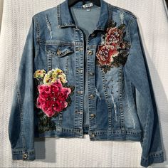 - Size Medium Misses - Lightly Distressed Jacket With Floral Appliques And Beaded Details - Buttoned Front - Chest Pocket - Cotton, & Elastane Material - Machine Washable - Medium Wash Denim - Shoulder Length Is 19” - Jacket Length Is 23” Never Worn And Looks New! Comes From A Smoke Free Home! Denim Floral Print Long Sleeve Outerwear, Fitted Floral Print Denim Jacket, Fitted Pink Denim Jacket For Spring, Fitted Pink Denim Jacket With Long Sleeves, Pink Fitted Long Sleeve Denim Jacket, Multicolor Floral Embroidered Spring Outerwear, Spring Multicolor Floral Embroidered Outerwear, Fitted Pink Denim Outerwear, Casual Pink Outerwear With Floral Embroidery