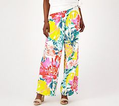 From the beach to the barbecue, these stretchy pull-on pants are ready to take on your active summer schedule. The breezy bottoms are lightweight, comfy, and feature a wide-leg silhouette, allowing for freedom of movement during those early-evening strolls along the boardwalk.  Plus, there are so many styling options. Pair them with a tank top and strappy slides, a T-shirt and leather sneakers, or a button-front blouse and wedge espadrilles. Look forward to warmer weather ahead and spend those s Summer Vacation Wide Leg Pants With Pull-on Style, Casual Bottoms With Elastic Waistband For Warm Weather, Casual Stretch Summer Pants, Versatile Summer Pants With Pull-on Style, Summer Versatile Pull-on Pants, Versatile Summer Pull-on Pants, Versatile Beach Pants With Loosely Fitted Hips, Tropical Wide Leg Vacation Bottoms, Versatile Stretch Wide Leg Pants For Vacation