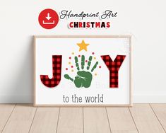 a christmas sign with the words joy to the world in red, green and white