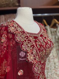 Ruby red velvet beautified with intricate floral zari and resham embroidery all over enhanced by stone, French knots and sequins work embellishments.Completed look with matching embroidered blouse and net dupatta. Fabric: Velvet Size: 38/M Ready to Ship! Velvet Saree Set With Zari Work, Festive Velvet Lehenga, Festive Velvet Saree With Zari Work, Bollywood Velvet Saree With Zari Work, Semi-stitched Velvet Saree For Designer Wear, Festive Velvet Choli With Traditional Drape, Elegant Velvet Choli With Zari Work, Traditional Velvet Anarkali Set For Festive Occasions, Festive Velvet Choli With Dupatta