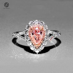 Gem Type: Russian Cubic Zirconia; Elegant and timeless pieces with diamond-like SHINE Gem size: approx. 8 x 5mm; Ring Width: approx. 15mm Main Gem CZ cttw: approx. 4 carat; Ring size available: 7,8,9 ( US size) Stone cut: Pear cut with Prong setting; Tarnish-resistant 18K white gold finish, Bling Shine! Packaging: High quality hand-made ring box; Best presentation! Pink Gold Wedding Rings, Pear Wedding Ring, Proposal Wedding, Pink And Gold Wedding, Engagement Proposal, Fancy Rings, Pink Sapphire Ring, Engagement Ring Sizes, Dreamy Wedding