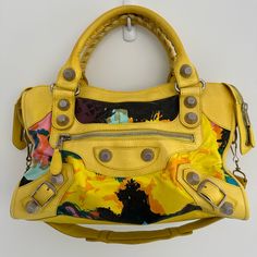 Very Rare, Hard To Find Bag. Fair Pre-Loved Condition. Some Leather Distressing Consistent With Age And Use. Some Minor Fading Around The Corners. Approx Size: 15 X 10 X 5 Inches Yellow Rectangular Bag With Branded Hardware, Yellow Shoulder Bag With Branded Hardware For Travel, Yellow Shoulder Bag With Branded Hardware, Yellow Rectangular Bags With Branded Hardware, Yellow Travel Bag With Branded Hardware, Luxury Yellow Shopping Bag, Yellow Leather Shoulder Bag With Branded Hardware, Chic Multicolor Bag With Branded Hardware, Designer Multicolor Satchel For Travel