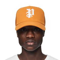 Made of cotton twill with a gothic Purple Brand monogram, this orange trucker hat is a classic paneled design with a curved visor and tonal stitching. Pre Fall 2024 White Label Front: 100% Cotton / Back: 100% Polyester Classic Trucker Hat With Curved Visor For Streetwear, Orange Trucker Hat For Streetwear, Orange Snapback Baseball Cap For Spring, Orange Snapback Hats For Streetwear, Orange Curved Brim Snapback Hat, Casual Orange Trucker Hat For Streetwear, Orange Curved Brim Trucker Hat, Orange Curved Brim Baseball Cap For Streetwear, Orange Cap For Streetwear