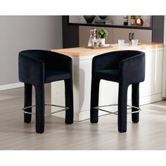 Welcome modern style into your kitchen or dining room with this 2-piece set of counter stools. Their low-backs, upholstered seats, and backrests are wrapped in soft fabric for an inviting look and textured feel. The bucket seats are padded with foam, so you can sit in comfort while you enjoy your morning coffee or a casual meal. The legs of this barstool feature a triangular structure for unrivaled stability, allowing you to enjoy your mealtime in comfort. Dimensions: Overall dimensions 22.5" (W Barrel Bar Stools, Chairs For Kitchen Island, Chairs For Kitchen, Kitchen Island Dining Room, Island Dining Room, Barrel Bar, Kitchen Island Dining, Island Dining, Bar Stools With Backs