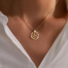 This volleyball necklace is the perfect accessory for volleyball lovers. Crafted from sterling silver, this custom sports pendant makes an ideal gift for players, coaches, or fans who love the game. Our handmade silver necklaces make wonderful and delicate gifts for you.  Materials: -High Quality 925 Sterling Silver -18k Gold Plated Silver -18k Rose Gold Plated Silver Colors: -Gold -Rose Gold -Silver Please choose from options tag, if you would like a different color than the one shown in our pi Track And Field Necklace, Volleyball Necklace Jewelry, Cute Basketball Necklace, Volleyball Earrings, Sporty Personalized Necklaces For Sports, Volleyball Necklace, Team Gifts, Gold Plated Silver, Personalized Necklace