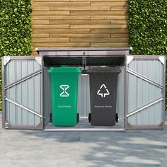 two green trash cans are in the middle of a metal structure that is surrounded by greenery