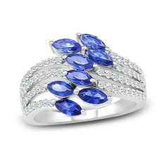 This unique ring features a vibrant array of marquise-cut blue lab-created sapphires. Rows of sparkling white lab-created sapphires sweep along the curving sterling silver band to complete the gorgeous look. Blue Marquise Cut Jewelry With Diamond Accents, Blue Marquise Cubic Zirconia Diamond Ring, Blue Marquise Cut Cubic Zirconia Jewelry, Blue Cubic Zirconia Marquise Cut Jewelry, White Lab, Sapphire Engagement Ring Blue, Special Ring, Ring Blue, Silver Prices