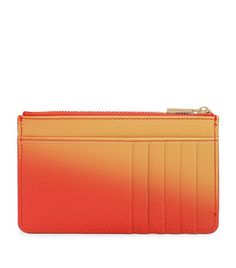 Even the most overlooked accessories will soon become a favourite when crafted under Dolce & Gabbana's careful hand. This gradient design card holder is made in Italy from butter-soft leather and shaped to a slim, sleek profile that will house all of your cards and slip into your go-to handbag with ease. Orange Leather Wallet With Card Slots, Orange Rectangular Wallets With Interior Card Slots, Orange Rectangular Wallet With Interior Card Slots, Orange Wallet With Card Slots For Daily Use, Orange Card Holder With Card Slots For Everyday Use, Orange Travel Wallet With Card Slots, Orange Travel Wallet, Orange Rectangular Wallets With Card Slots, Orange Bag With Card Slots For Daily Use