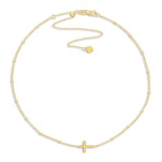 A bold statement of faith, a dynamic sideways cross shimmers powerfully in the center of this timeless women's choker necklace. Fashioned in 14K yellow gold, the adjustable 15-inch cable chain secures in place with a lobster clasp. Gold Adjustable Minimalist Cross Necklace, Adjustable Gold Cross Pendant Necklace, Adjustable Yellow Gold Crucifix Jewelry, Elegant Adjustable Gold Cross Necklace, Statement Of Faith, Cross Choker Necklace, Women Choker Necklace, Cross Choker, Jared The Galleria Of Jewelry