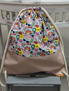 a purse sitting on top of a white chair