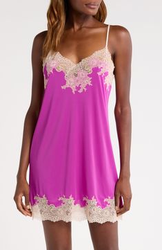 Bring an alluring style refresh to your sleepwear collection with this silky satin chemise veiled with pretty floral lace. 25 1/2" center front length (size Medium) V-neck Adjustable straps Unlined 100% polyester with 90% nylon, 10% elastane trim Machine wash, line dry Imported Satin V-neck Slip Dress With Contrast Lace, V-neck Satin Chemise For Wedding Night, Feminine Satin V-neck Sleepwear, Feminine Silk Slip Dress With Delicate Lace, Pink Spaghetti Strap Chemise For Wedding Night, Modal Satin Summer Sleepwear, Modal Satin Sleepwear For Summer, Satin Sleeveless Nightgown With Delicate Lace, Sleeveless Satin Nightgown With Delicate Lace