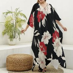 Indulge in elegance and comfort with our V-Neck Kimono Dress, a luxurious addition to your lounge and sleepwear collection.  Crafted from imitation silk (97% polyester and 3% spandex), this robe drapes beautifully and feels incredibly soft against the skin.  The regular fit silhouette ensures a comfortable and flattering wear, while the V-neck adds a touch of sophistication.  Perfect for lounging at home or as a stylish cover-up, this kimono dress is a thoughtful gift for any woman who deserves Elegant V-neck Sleepwear For Lounging, Elegant V-neck Kaftan For Vacation, Elegant Floral Print V-neck Sleepwear, Elegant V-neck Sleepwear For Vacation, Floral Print V-neck Loungewear Dress, Spring V-neck Lounging Dress, Black Printed V-neck Kaftan, Elegant Maxi Length Sleepwear For Loungewear, Elegant Printed V-neck Kaftan