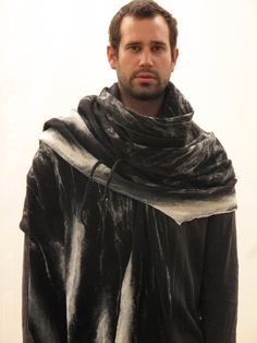 "Mens poncho, Blanket scarf, Huge black scarf, Tribal clothing, Nuno felt scarf, Wool scarf, Gothic scarf, Fur cape, Goth cape, Shaman cape This is a really huge scarf. You can wrap yourself from shoulders to knees or have it around your neck a few times. It is handmade in a nuno felt technique from extra fine merino wool on black cotton gauze. It is very soft, lightweight and warm. I make each scarf myself using only natural materials in my \"Slowlab workshop.\" If you are in a hurry and need y Black Shawl For Fall, Black Shawl Wrap For Fall, Black Wool Scarves For Fall, Black Scarf For Fall, Black Wool Scarf For Winter, Black Wool Shawl For Winter, Black Wool Winter Shawl, Black Shawl Scarf For Winter, Black Winter Shawl Wrap