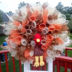 a turkey wreath on top of a chair