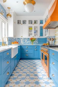 kitchen refresh ideas Aesthetic Kitchen Tiles, Blue White Cabinets Kitchen, Orange Kitchen Cabinets Modern, Orange Blue And White Aesthetic, Bold Color Kitchen, Retro Tiles Kitchen, Kitchen Ideas Blue Cabinets, Kitchen Ideas Flooring, Bright Blue Cabinets