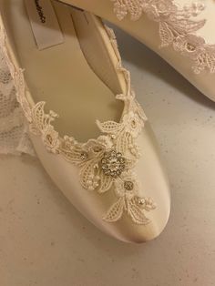 Victorian style Flat Shoes Gorgeous flat shoes decorated with fine white American lace Pearls & Glass Crystals Retro Victorian - Modern look, I'm very pleased with my new design! I only have so many yards, order as soon as you fall in love with them ;0 These flats are satin, with man-made insoles, and sueded leather outer soles. (Please Note: These are NOT Professional Ballerina Slippers. They are Bridal Ballet Style Flats.) Not for Wet areas/grass. Colors: Eggplant/Ivory Eggplant/white, Whi Elegant Low Heel Wedding Shoes With Lace Trim, Closed Toe Wedding Shoes With Lace Trim, Elegant Wedding Shoes With Laces, Elegant Wedding Shoes With Lace Trim, Embellished Elegant Ballet Flats, Lace Flat Heel Wedding Shoes For Ceremony, Flat Heel Lace Wedding Shoes, Elegant Wedding Shoes With Laces And Round Toe, Elegant Wedding Shoes With Lace Work