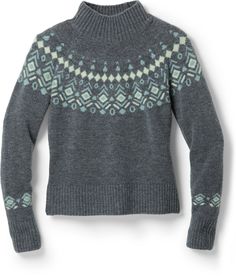 Nothing says sweater weather like the a Fair Isle pattern and warm merino wool. The women's KUHL Alpina sweater has both  along with a wide rib-knit mock neck  cuffs and hem to make it even more cozy.