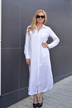 "Maxi Shirt Dress White Loose Shirt Dress. Comfortable Cotton Shirt Dress with long sleeves with cuff. Asymmetric length and pockets. The dress is stylish with a collared neckline. The dress is perfect for your everyday life and you can also wear it with heels and a belt for night events 🌙.  Check your size here 📌 SIZE CHART 📌  📌 Size * XS * (US 2, UK 6, IT 36, FR 34, DE 32, J 3)  Bust    33.5\"  /  85 cm Waist  26\"     /   66 cm Hips    36\"     /   91 cm Height 5.3\"   /  160 cm  📌 Size Fall Daywear Shirt Dress With Cuffed Sleeves, Cuffed Sleeves Shirt Dress With Spread Collar, Daywear Shirt Dress With Cuffed Sleeves And Spread Collar, Elegant Cotton Shirt Dress With Shirttail Hem, Classic Long Sleeve Shirt Dress For Office, Classic Long Sleeve Shirt Dress For Work, Long Cotton Shirt Dress For Work, Long White Cotton Shirt Dress, Elegant Long-sleeved Shirt Dress With Cuffed Sleeves