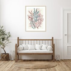 a living room with white walls and wooden flooring has a bench in front of it