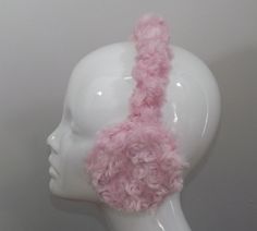 A pair of adjustable earmuffs.  These will fit youth through adults.  Made with a sturdy plastic base with soft, cushioned ear pads.  Comfy and snug to keep your ears toasty warm. These are made from a light pink faux fur on the headpiece and on the earpieces.  The fur has swirls or rosette details. From a smoke-free and pet-free environment. If I've significantly overestimated shipping, I will issue you a partial refund. email me with any questions. Check out my other items http://www.evianzo.e Pink Faux Fur, Earmuffs, Vintage Fabrics, Ear Warmers, Deep Purple, Vintage Finds, Handcrafted Jewelry, Headpiece, Light Pink