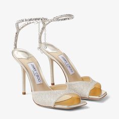 SAEDA SANDAL 100 | Platinum Ice Dusty Glitter Sandals with Crystal Embellishment | Winter 2022 collection | JIMMY CHOO UK Jimmy Choo Saeda, Evening Heels, Glitter Sandals, Jimmy Choo Heels, Crystal Chain, Jimmy Choo Shoes, Crystal Embellishment, Designer Sandals, Ankle Straps